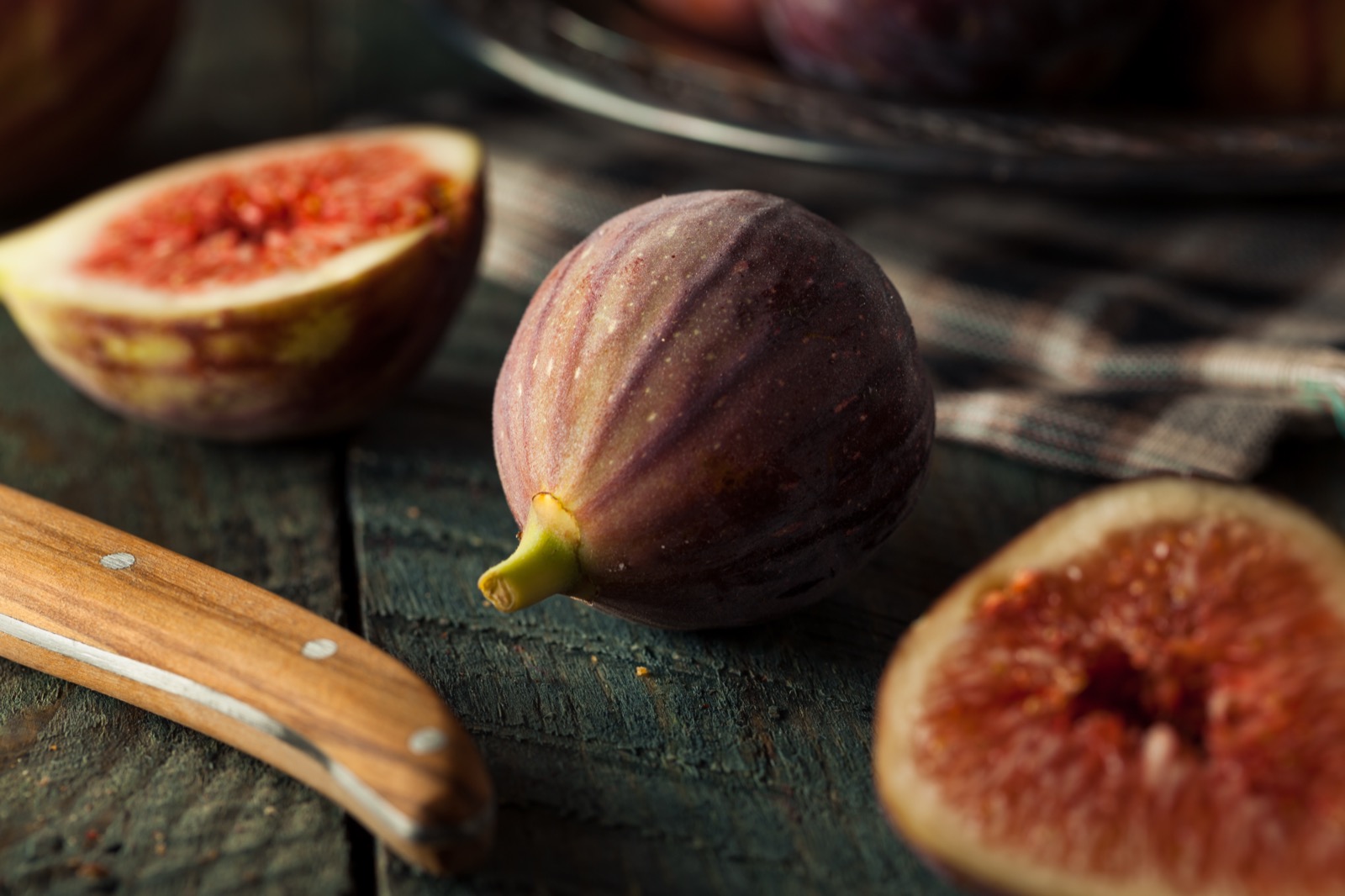 Fresh figs on a wooden cutting board