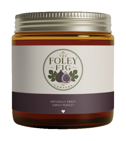Amber glass jar of Foley Fig preserves with cream and plum label